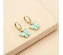 Gold Toned Huggie Hoops With Attached Butterfly Charm Hanging Earrings Gold Plated For Women and Girls Cyan Gold Toned Huggie Hoops With Attached Butterfly Charm Hanging Earrings Gold Plated For Women and Girls Cyan