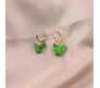 Gold Toned Huggie Hoops With Attached Butterfly Charm Hanging Earrings Gold Plated For Women and Girls Green Gold Toned Huggie Hoops With Attached Butterfly Charm Hanging Earrings Gold Plated For Women and Girls Green