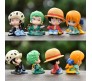 Anime Set of 4 One Piece Action Figure 4-5 cm Chibi Style Collectible Zoro Luffy Car Dashboard, Cake Decoration and Study Table Multicolor